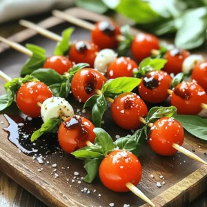 - Cherry tomatoes: Look for plump, ripe cherry tomatoes. They should be vibrant and firm. Their sweetness adds a great flavor to the skewers. - Fresh basil leaves: Choose bright green, fresh basil. Avoid wilted or brown leaves. Fresh basil adds a lovely aroma and taste. - Mozzarella balls: Use small mozzarella balls, also known as bocconcini. They should be soft and creamy. You can also find them in various sizes. - Additional ingredients: - 2 tablespoons balsamic glaze for sweetness - 1 tablespoon extra virgin olive oil for richness - Sea salt to enhance flavors - Freshly ground black pepper for a mild kick With these ingredients, you create a fresh and flavorful delight that is easy to make. Check out the Full Recipe for more details! Start by washing the cherry tomatoes and basil leaves. Rinse them under cold water to remove any dirt. After washing, gently pat them dry with a clean kitchen towel. This step is key to keeping your skewers fresh and tasty. Now, let's assemble the skewers. Grab a wooden skewer. Slide on one cherry tomato, followed by a fresh basil leaf. Next, add a mozzarella ball. Repeat this pattern until each skewer has three sets of ingredients. This creates a colorful and balanced look. Once you've made all the skewers, arrange them on a serving platter. Make sure they are spaced out well. This way, they look inviting and are easy to grab. It’s time for the fun part! Drizzle the balsamic glaze over the assembled skewers. This adds a sweet tang to each bite. Next, splash a bit of extra virgin olive oil over them. This will enhance the flavors and give a beautiful shine. Now, season with a sprinkle of sea salt and freshly ground black pepper. This simple step brings out the best in all the ingredients. Taste a skewer to see if you need more seasoning. For the best serving tips, consider garnishing the platter with extra basil leaves. You can also serve the skewers on a rustic wooden board for a charming touch. Enjoy sharing this fresh and flavorful delight with friends and family! Choose ripe tomatoes for the best taste. Look for tomatoes that are firm and bright. Cherry tomatoes work great due to their sweetness. Quality mozzarella makes a big difference too. Use fresh mozzarella balls, or bocconcini, for that creamy bite. Fresh basil adds a burst of flavor. Look for vibrant green leaves, free from spots. This gives your skewers a fresh, lively taste. Stack your ingredients artfully for a stunning look. Start with a cherry tomato, then add basil, and finish with mozzarella. Repeat this for a colorful pattern. Be gentle when threading items on the skewer. Push them on slowly to avoid splitting the mozzarella. This way, you keep them whole and beautiful. Caprese Salad Skewers pair well with light drinks. Try serving them with a crisp white wine or sparkling water. For gatherings, arrange them on a large platter. This makes for an eye-catching display. You can also garnish with extra basil leaves for flair. If you want to impress, serve on a rustic wooden board. It makes the colors pop and enhances the overall vibe. {{image_4}} You can make Caprese salad skewers even better by adding new flavors. Adding prosciutto or salami gives a nice savory twist. These meats add a rich taste that pairs well with the fresh ingredients. Just slice them thinly and wrap a piece around the mozzarella ball. It adds a salty, meaty bite that many enjoy. Another fun way to boost flavor is by adding olives or artichokes. These ingredients bring a briny taste that contrasts well with the sweetness of tomatoes. Simply add a few olives or artichoke hearts between the layers on the skewer. This adds a fun texture and flavor mix to your dish. If you're looking for vegan options, you can use plant-based cheese. Many brands now offer great alternatives that melt and taste like mozzarella. This way, everyone can enjoy the skewers without missing out on flavor. For those who need gluten-free options, these skewers are already safe. Just ensure any added ingredients, like sauces, are gluten-free. This makes Caprese salad skewers a perfect dish for gatherings, catering to many diets. To keep your Caprese Salad Skewers fresh, place them in an airtight container. This helps to lock in flavor and moisture. If you use a plate, cover it well with plastic wrap. Store them in the refrigerator. They stay fresh for up to two days. After that, the basil may wilt, and the tomatoes might lose their crunch. If you have leftover ingredients, you can freeze them. However, I recommend freezing only the mozzarella and tomatoes. Wash and dry them first, then place them in a freezer bag. Remove as much air as you can before sealing. When ready to use, thaw them in the fridge overnight. Reheating isn't typically needed for these skewers. They taste best fresh. If you must, gently warm the tomatoes and mozzarella in a pan over low heat. Avoid cooking them too long or they will lose their texture. Enjoy the vibrant flavors in every bite! Serve Caprese Salad Skewers on a large platter. Arrange them neatly for a colorful look. You can drizzle balsamic glaze over them just before serving. This adds a touch of sweetness and makes them shine! For a nice touch, add fresh basil leaves around the skewers. This enhances the aroma and adds charm. Yes, you can make Caprese Salad Skewers ahead of time. Assemble them a few hours before serving. Keep them covered in the fridge to stay fresh. Just add the balsamic glaze right before serving. This keeps the flavors bright and the ingredients crisp. To keep basil fresh, store it in a glass of water. Place it on your kitchen counter, away from direct sunlight. You can also wrap basil leaves in a damp paper towel. Then, put them in a plastic bag in the fridge. This helps maintain their flavor and color. You can add prosciutto or salami for a savory kick. Olives or artichokes also work well for extra flavor. Feel free to mix in roasted peppers or avocado slices too. These additions bring new tastes and textures to your skewers. One common mistake is using dull or old ingredients. Always choose fresh tomatoes and cheese. Another mistake is not seasoning enough. A sprinkle of salt and pepper boosts flavor. Lastly, avoid overcrowding the skewers. Leave space between ingredients for better presentation and taste. For the full recipe, check out the Caprese Salad Skewers section! In this post, we explored making delicious Caprese Salad Skewers. We covered key ingredients like tomatoes, basil, and mozzarella. I shared easy steps for preparation and tips for serving. You learned how to add your twist with flavors and dietary options. Proper storage was also key for fresh skewers. Now you can impress friends with your tasty creations. Enjoy making these skewers for any occasion!
